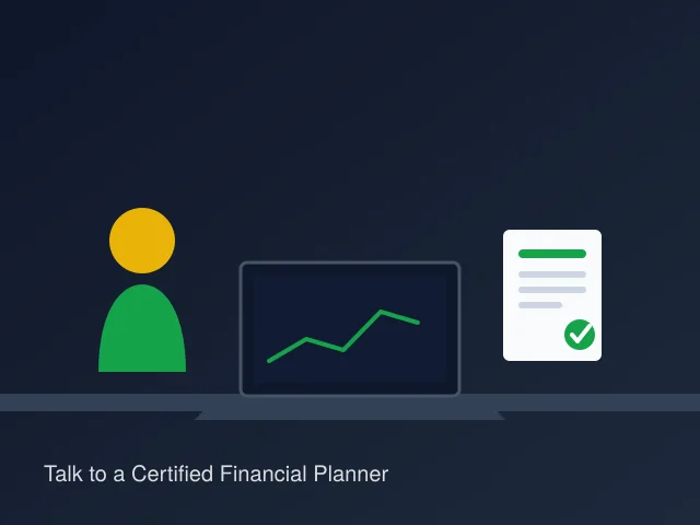 Certified financial planner working at a modern American office desk with a laptop showing an upward investment growth chart, representing personalized wealth-building and financial advisory consulting services